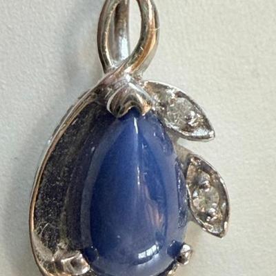 14k White Gold And Blue Star Sapphire Pendant - .94 Grams