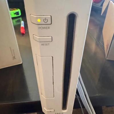 Wii Console With Controllers And Games