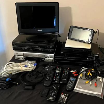 Multiple VCR, DVD, and Blu-Ray Players with Portable TV