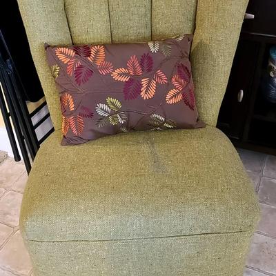 Green Upholstered Accent Chair with Decorative Pillow