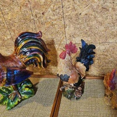 Roosters And Hen Statues