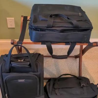 Travel Rack And 3 Suitcases 