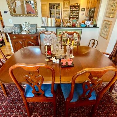 Sale Photo Thumbnail #90: Expandable dining room table with two leaves, pads and 8 chairs