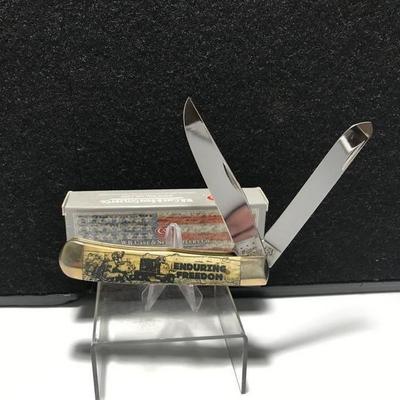 Sale Photo Thumbnail #4: Case Trapper Antique Bone Handle Enduring Freedom
Case 8 dot USA 6254 SS Honoring Veterans of Afghanistan War Measures: 4" long Blades: 2 SS Badge: none etched Enduring Freedom Box: original.

