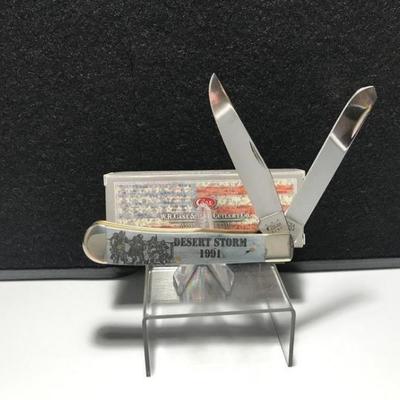 Sale Photo Thumbnail #8: Case Trapper Blue Bone Handle Desert Storm
Case 8 dot USA 6254 SS Honoring Veterans of Desert Storm 1991 Measures: 4" long Blades: 2 SS Badge: none etched Desert Storm 1991 and a scene Box: original.

