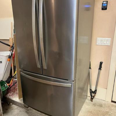 Sale Photo Thumbnail #228: $399 Whirlpool refrigerator- good condition, indentations on front otherwise works well