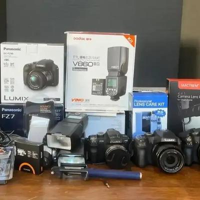 3 Lumix Cameras (DMC-FZ35, DMC-FZ70, DC-FZ80) & Lighting Accessories 