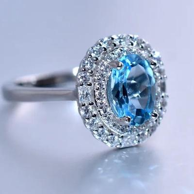 1.5 Carat Natural Oval Blue Topaz Sterling Silver Halo Ring