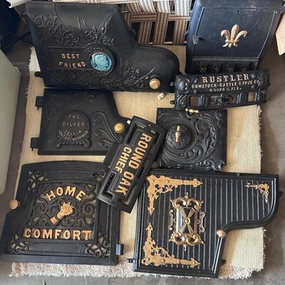 Sale Photo Thumbnail #44: A cast iron stove door art