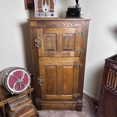 Sale Photo Thumbnail #36: A antique oak icebox