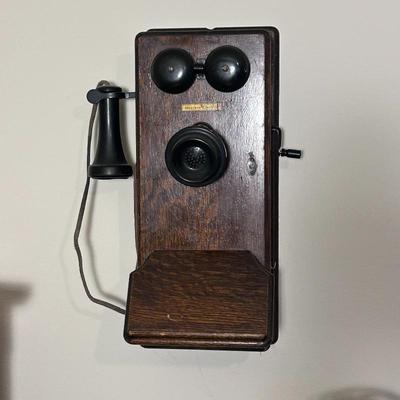 Sale Photo Thumbnail #51: A western electric wall telephone
