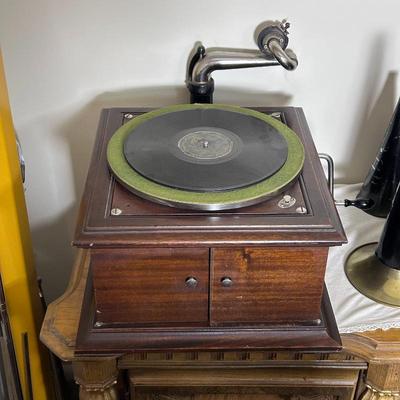 Sale Photo Thumbnail #12: A horn disc phonograph