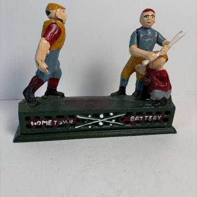 C cast iron mechanical coin bank