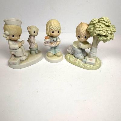 F hree piece enesco precious moments porcelain figurines