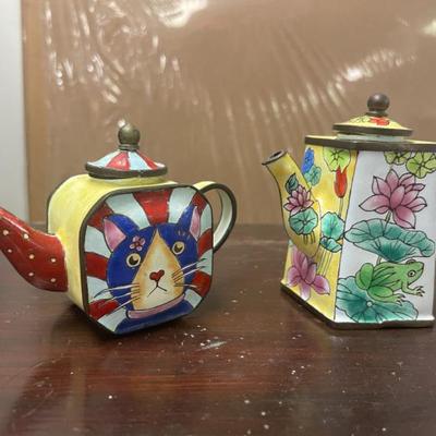 Sale Photo Thumbnail #87: ENAMEL PAINTED METAL TEAPOTS