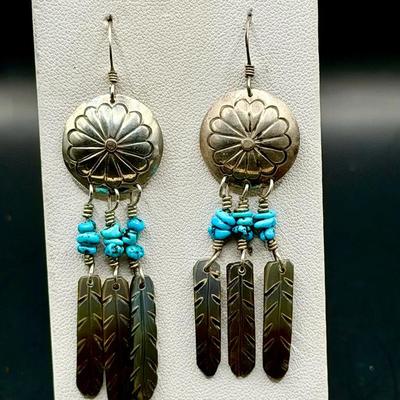 turquoise and sterling silver concho earrings with carved mother-of-pearl feather