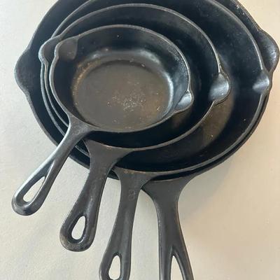 Three “Ugly” Cast Iron Pans And One Non Hammered Cast Iron Pan. 