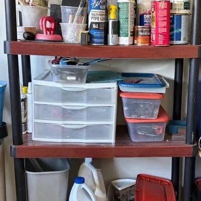 Garage Shelving Unit with Tools, Paint, and Miscellaneous Items