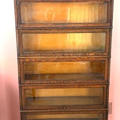 Sale Photo Thumbnail #11: Antique quarter sawn oak Macey’s 5 section stacking bookcase. Bottom section  backboard will need attention., ht. 63”, wd. 34”