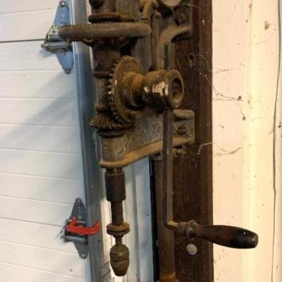 Sale Photo Thumbnail #132: Antique wall-mount nand-crank post drill or blacksmith drill press