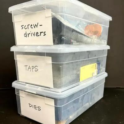 An Organized Selection Of Screwdrivers, Taps And Dies