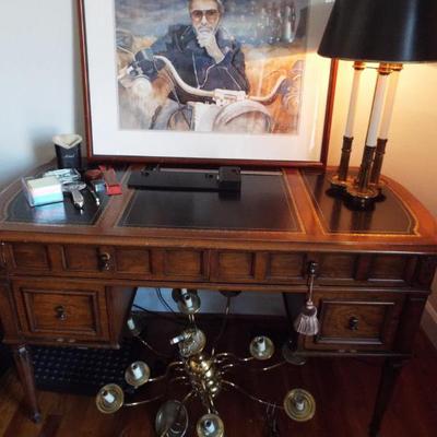 Sale Photo Thumbnail #163: DESK WITH BURT REYNOLDS ON A BIKE FROM THE MOVIE "HOOPER"
