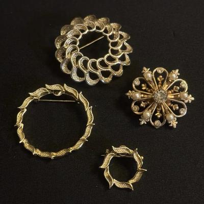Golden Brooches