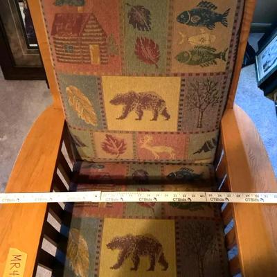 Cabin Themed Rocking Chair With Wood Arms