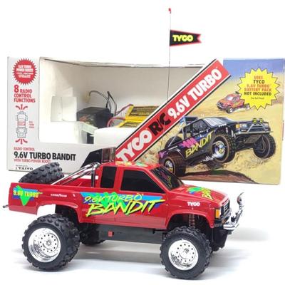 Sale Photo Thumbnail #48: Tyco R/C 9.6V Turbo Bandit Toy Truck & Box (Works)
