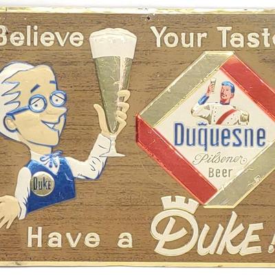 Sale Photo Thumbnail #553: Vintage Duquesne Duke Beer Tin Embossed Sign