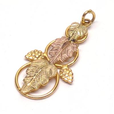 Sale Photo Thumbnail #284: 10K Tri Color Gold Bkacl Hills Leaf Pendant