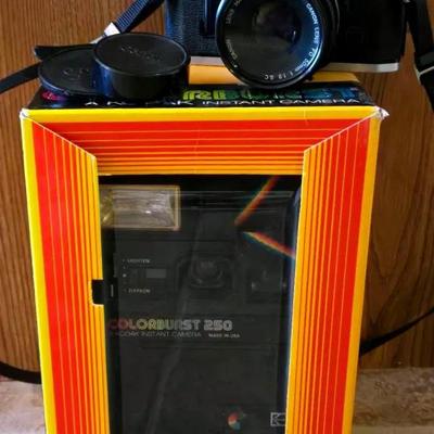 "Kodak" Colorburst Instant Camera and "Canon" AE Camera