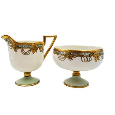 Sale Photo Thumbnail #53: Lot 210  
Willets Belleek Antique Open Sugar and Creamer Set