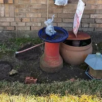 Garden Hose Bucket With Hose And Garden Items