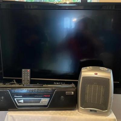 Dynex flat screen TV with remote,  Vintage Panasonic cassette-player/radio, Lasko heater 