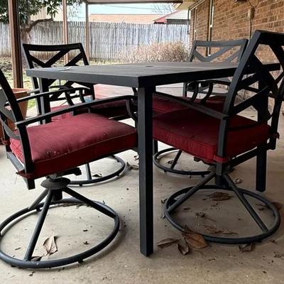 Metal Patio Table With Four Swivel Chairs And Cushions