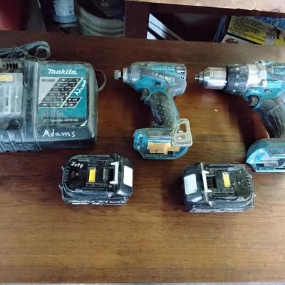 Two Makita Drills And Charger