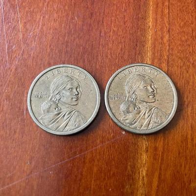 Two Sacagawea Dollar Coins
