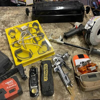 Lot Of Various Tools Including A Chainsaw Sharpener