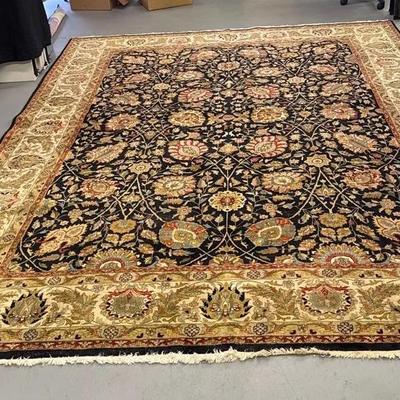 hand-knotted black and beige wool area rug 