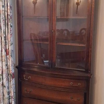 Dark Wood Corner Hutch with Glass Doors and Four Drawers