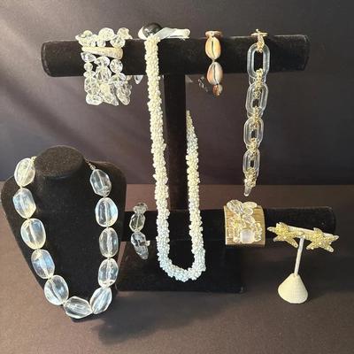 Jewelry Assortment Including An Hawaiian Shell Lei Necklace And Cowrie Shell Bracelet 