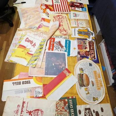 Assortment of Vintage Fast-Food Paper Bags and Promotional Items