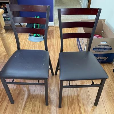 Two Black Folding Chairs