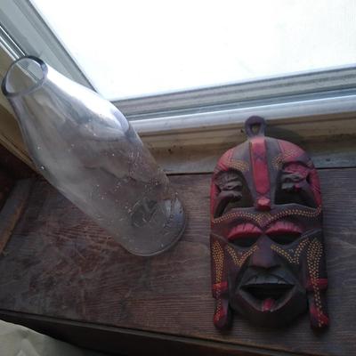 Antique 1916 bottle and carved wooden mask