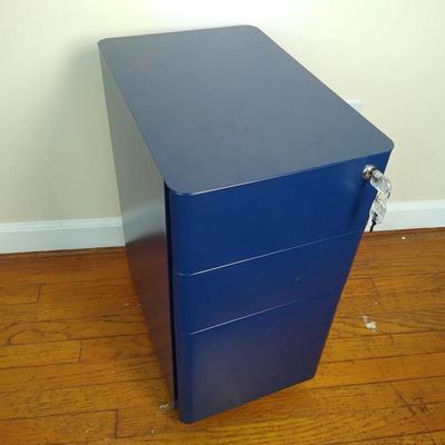 Small blue metal storage cabinet with lock and keys