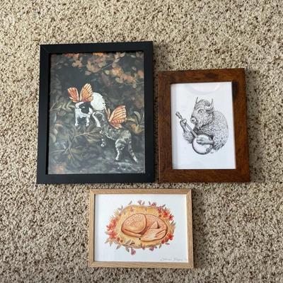 Three Framed Animal Prints Including A Buffalo Playing A Banjo