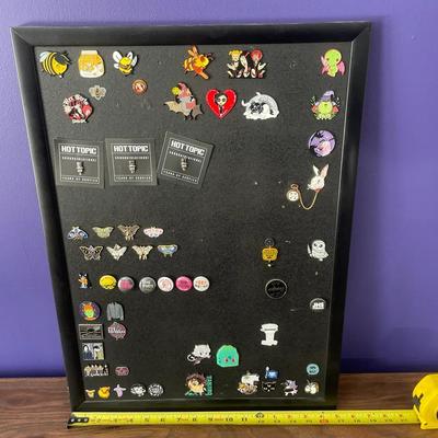 Lot Of Pins On Display Board