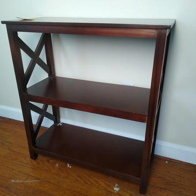 Small shelf with X motif