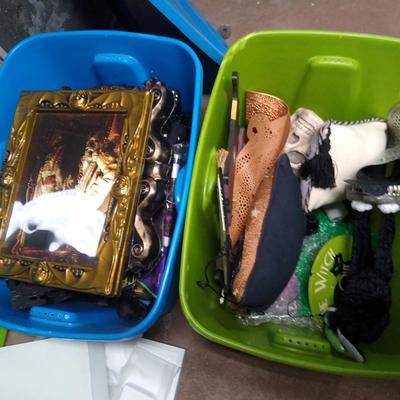 Two bins of halloween decor